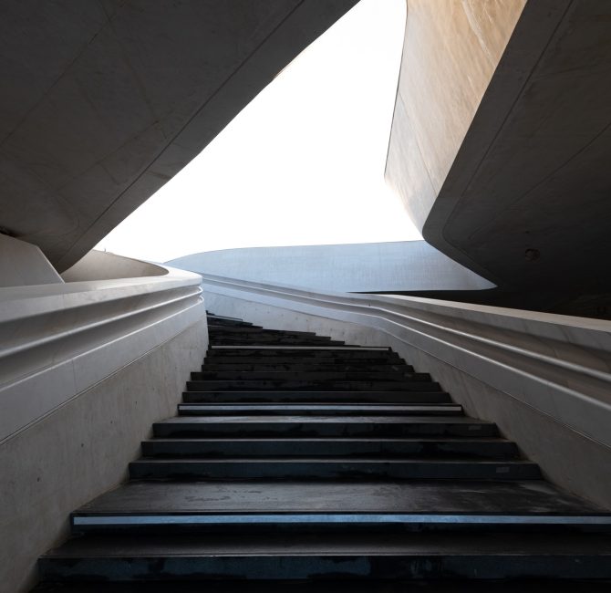 modern-architecture-and-empty-staircase-leading-to-a-bright-open-space.jpg